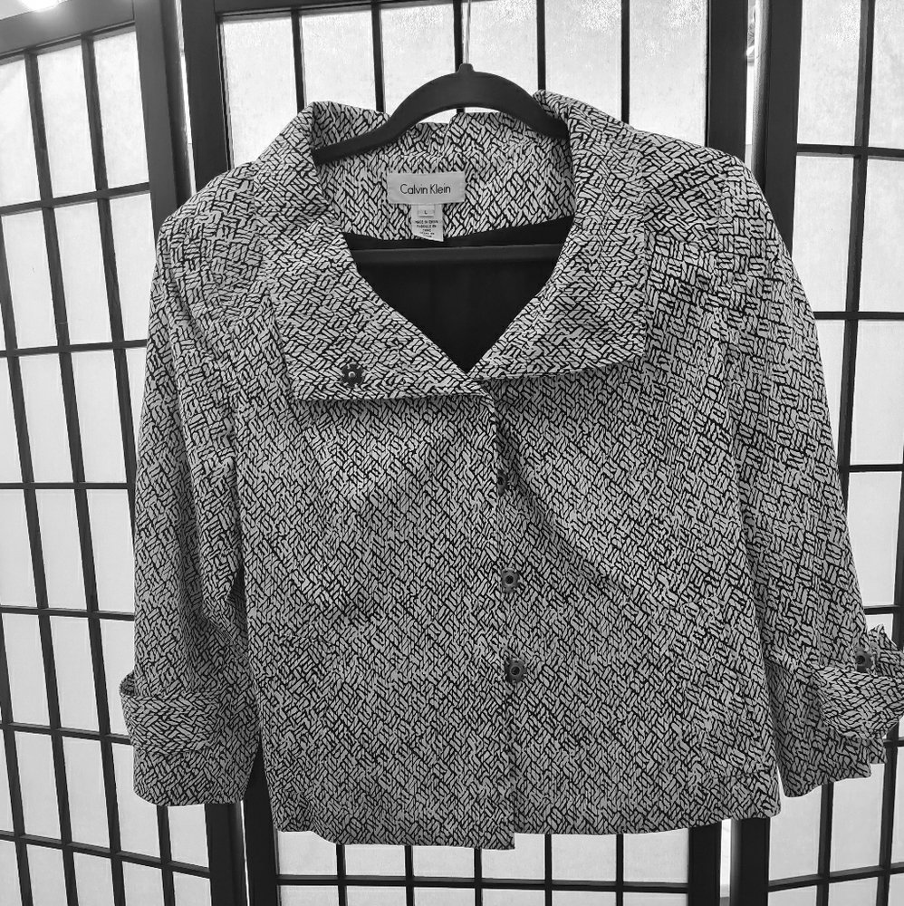 Calvin Klein patterned blazer.